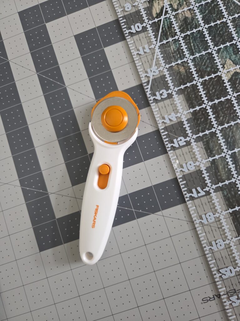 Paper Weave Art from Wallpaper Scraps: Easy DIY Tutorial rotary cutter and cutting mat with clear ruler
